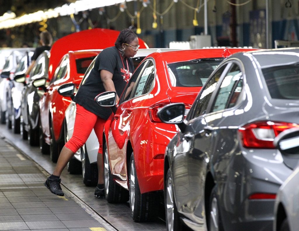 Workers put the final touches on the Cruze cars at the GM Lordstown Complex