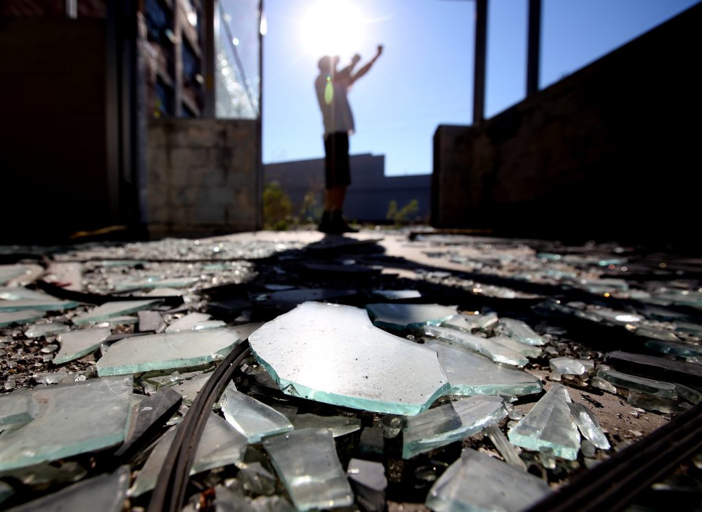 Broken glass from the front entrance of the Packard Electric Plant.